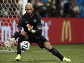 Tim Howard did all he could for Team USA yesterday against Belgium but it wasn't enough. (AFP)