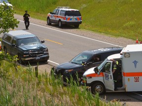 A highway construction worker was struck and killed by the green pickup truck seen in the background on the Hwy. 3 bypass just before noon Wednesday. (Don Biggs, QMI Agency)