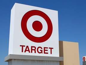 A Target sign is pictured next to one of their stores in Vista, California April 16, 2014.  REUTERS/Mike Blake