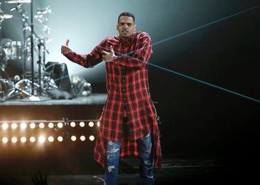 CHRIS BROWN: Welcome Back! Loved your flannel nightie on the BET Awards!
Now — hands where we can see them — get lost. Please.