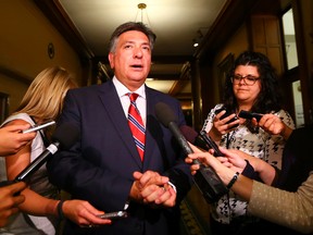 Finance Minister Charles Sousa talks about the upcoming budget at Queens Park on July 2, 2014. (Dave Abel/Toronto Sun)