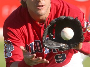 Winnipeg Goldeyes second baseman Brock Bond catches a ball during play against the Kansas City T-Bones in American Association baseball in Winnipeg, Man. Wednesday July 02, 2014.
Brian Donogh/Winnipeg Sun/QMI Agency