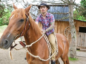 Woodbine jockey Justin Stein and his gelding, Stormy Lord. (Dave Thomas, Toronto Sun)