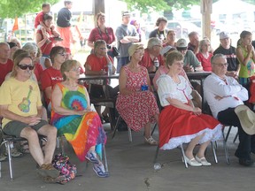 Watching entertainers under the Memorial Park pavilion Young Canada Performing 'Stage.' CHRIS ABBOTT/TILLSONBURG NEWS