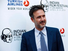 Cast member David Arquette poses at a screening of "Sold" on the opening night of the Indian Film Festival of Los Angeles in Los Angeles, California April 8, 2014. (REUTERS/Mario Anzuoni)