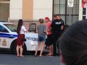 This image shows Ottawa Police arresting Philadelphia Flyers star Claude Giroux outside a downtown Ottawa club on Canada Day, July 1, 2014. Giroux had allegedly grabbed the buttocks of an officer several times. He was later released without charge after a night in a police jail cell. (Submitted image OTTAWA SUN)