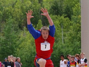 Ryan Taylor, of the Track North Athletic Club, competes in the boys triple jump event at the Legion track and field meet at the track at Laurentian University in Sudbury last month. Taylor, the reigning OFSAA junior boys triple jump gold medallist, will see how he stacks up at the national championships this weekend.