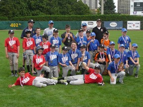 Mosquito league players from EBBA, South London, Thamesford and Dorchester gather after their 2013 Frank Colman Day game at Labatt Park.