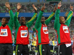 Jason Roger, far left, won bronze in the at the 2011 World Championships as part of the Saint Kitts and Nevis 4x100-metre relay team. (Reuters)