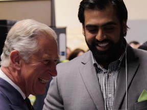 Obby Khan shares a laugh with Prince Charles during the Royal Visit to Winnipeg in May. (Submitted)