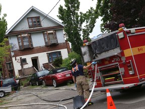 Toronto firefighters had to respond to 6 Paxtonia Blvd. in the Keele St. and Wilson Ave. area after fire destroyed the rear porch of the turn of the century farmhouse on July 3, 2014. (Dave Thomas/Toronto Sun)