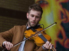 Jaron Freeman-Fox performs with his band The Opposite of Everything as Sunfest opened Thursday at Victoria Park. (Derek Ruttan/The London Free Press)