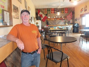 Mike Bouchard, president of the Lady Luck Riders Motorcycle Club stands in the clubhouse. Members of the group are supporting The Forever Young Memorial Ride. BRENT BOLES / THE OBSERVER / QMI AGENCY