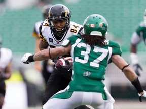 Bakari Grant will have to produce more than he did in the Ticats opening loss to Saskatchewan to keep the pressure of his QB, Zach Collaros on Friday in Edmonton. (AFP)