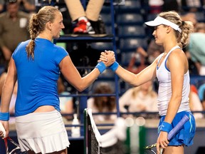 Petra Kvitova and Eugenie Bouchard shake hands after Kvitova prevailed in their Aug. 7, 2013, match at the Rogers Cup in Toronto. (Reuters)