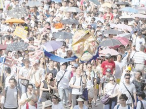 Protesters marched in a pro-democracy rally in Hong Kong on Tuesday, seeking greater democracy. When huge crowds took to Hong Kong?s streets to voice anger at Beijing?s ever-tightening grip, an unlikely group was marching in step: wealthy financiers fighting mainland influence over the city?s markets and political life. (Dale De La Rey/AFP PHOTO)