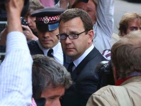 Former Editor of the News of the World Andy Coulson arrives for the sentencing at the Old Bailey court house in London July 4, 2014. REUTERS/Neil Hall