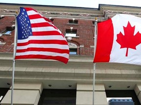 Canadian and U.S. flags in Ottawa.  (QMI AGENCY, file)