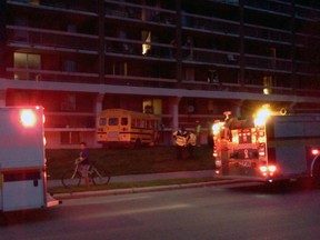 A stolen school bus slammed into an apartment building at 1825 Russell Rd., Thursday night. The driver fled on foot before cops could arrive. (GREG WHITE submitted image)