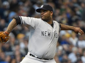 New York Yankees pitcher CC Sabathia (52) pitches in the first inning against the Milwaukee Brewers at Miller Park on May 10, 2014 in Milwaukee, WI, USA. (Benny Sieu/USA TODAY Sports)