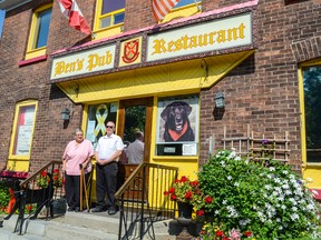 Owner Margaret Sanborn and manager Ted Powley stand outside Ben's Pub on Clergy Street. The pub is closing after nearly 40 years in business. (Alex Pickering/For The Whig-Standard)