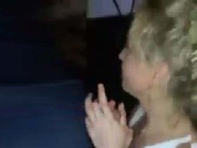 A British tourist was filmed performing oral sex on 24 men at a bar in Magaluf, Spain, in order to get a free drink. The unidentified girl reportedly performed the stunt to get a free bottle of Cava, or Spanish sparkling wine, which costs less than $5. (Photo: Screengrab/QMI Agency)