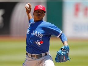 Blue Jays starter Marcus Stroman delivers a pitch against the Oakland Athletics in the first inning at O.co Coliseum on July 4, 2014. (CARY EDMONDSON/USA Today Sports)