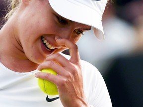 Eugenie Bouchard smiles during Wimbledon play this week at the All England Club in London. (Reuters)