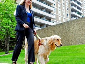 Diane Bergeron, she travels on airplanes with her seeing-eye dog Lucy.  Photo Courtesy/Curtis Comeau.