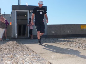 A participant in the Run Up for Rebound walks on the roof of the Kenwick building before heading back down and tackling the stairs again. BRENT BOLES / THE SARNIA OBSERVER