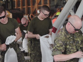 Military arrived in Portage la Prairie Saturday afternoon to help make sandbags. Up to 400 troops are expected to help out in the area