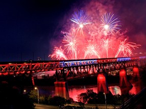 Canada Day fireworks erupt over the newly lit  High Level Bridge in Edmonton, Alberta. It was the first time the more than 50,000 LED lights were turn on for the public on July 1, 2014.  Hugo Sanchez/Edmonton Sun/QMI Agency