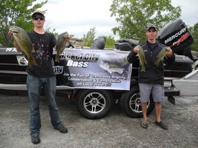 Teammates Simon Fortin and Justin Charron show some of their catch at the Nickel City Bass tournament held on Ramsey Lake on Sunday.
