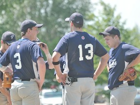 Several members of the Portage Padres talk on the mound during the Padres' 4-1 loss to Minnedosa July 6. (Kevin Hirschfield/THE GRAPHIC)