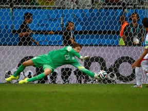 Goalkeeper Tim Krul of the Netherlands saves a shot by Costa Rica's Bryan Ruiz during a penalty shootout in their World Cup quarterfinal match at the Fonte Nova arena in Salvador, Brazil on Saturday, July 5, 2014. (Michael Dalder/Reuters)