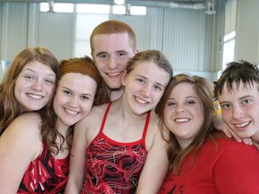 Eight members of the Kingston Y Penguins are going for a world-record swim this month by swimming relay style from Burlington to Kingston. 
Six of the team members are, from left to right, Natasha Dobson, Michelle Sempowski, Harley Bolton, Abi Tripp, Jenna Lambert and Nick Streicher (Submitted photo)