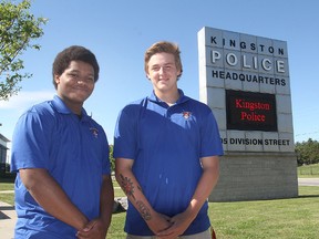 Jahmaal Branker, left, and Austin Kimmett are the two high school students chosen this summer to be part of the Youth in Policing Initiative run by Kingston Police. (Michael Lea/The Whig-Standard)