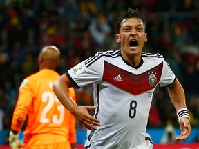 Germany's Mesut Ozil celebrates scoring against Algeria during extra time in their World Cup Round of 16 game at the Beira Rio stadium in Porto Alegre, Brazil on June 30, 2014. (Darren Staples/Reuters)