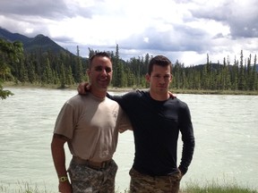 U.S. Army Ranger Lucas Carr (left) and Edmonton Oilers captain Andrew Ference. Photo by Rob Tychkowski/QMI Agency