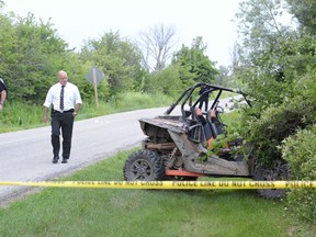 Halton police at the scene of a fatal collision between an ATV and a cyclist on Lower Base Line, east of Fourth Line, Sunday, July 6, 2014. (Andrew Collins/Special to the Toronto Sun)