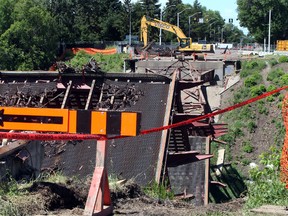 Crews take down the 102 st bridge on to Groat Road in Edmonton, Alberta on Sunday, July 6, 2014.  Groat Road will reopen on Wednesday, July 8. Perry Mah/Edmonton Sun