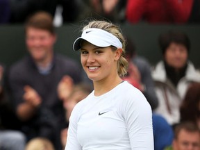 LONDON, ENGLAND - JUNE 24:  Eugenie Bouchard of Canada smiles during her Ladies' Singles first round match against Galina Voskoboeva of Kazakhstan on day one of the Wimbledon Lawn Tennis Championships at the All England Lawn Tennis and Croquet Club on June 24, 2013 in London, England.  (Photo by Julian Finney/Getty Images)