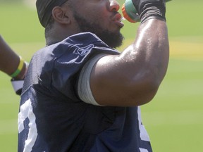 Bryant Turner watched the Bombers win over Ottawa from a hospital room in Mobile, Ala., with his wife and newborn daughter