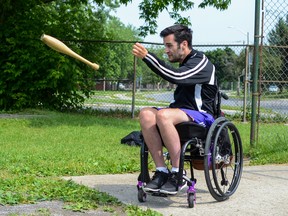 Brett Babcock throws a club during a training session at Loyalist Collegiate and Vocational Institute on Monday. (Alex Pickering/For The Whig-Standard)