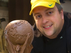 Marc Forrat has made  a chocolate World Cup trophy to raffle. The chocolateur has difficultly picking his favourite team, being born in Brazil to French parents and married to a Portuguese-Canadian. (MIKE HENSEN, The London Free Press)