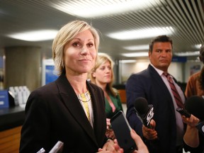 Jennifer Keesmaat , chief planner for the City of Toronto, meets the media at Toronto City Hall Council today on Monday.(STAN BEHAL, Toronto Sun)