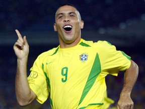 Brazilian striker Ronaldo celebrates after scoring the first goal against Germany during the World Cup final in Yokohama, Japan on June 30, 2002. (Dylan Martinez/Reuters/Files)