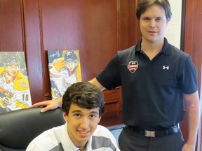 Jordan Kyrou has signed a contract with the Sarnia Sting. Pictured with the 16-year-old is Sting GM Nick Sinclair. (Submitted Photo)