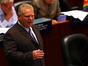 Councillor Doug Ford during council meeting at Toronto City Hall on Tuesday July 8, 2014. (Dave Abel/Toronto Sun)