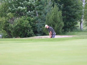 Nick Quesnel prepares to hit out of a bunker at Lively Golf Course during last weekend's Ryder Cup. The local golfer, who recently signed an NCAA golf scholarship, is taking part in the Ontario Men's Amateur Championship in Georgetown this week.